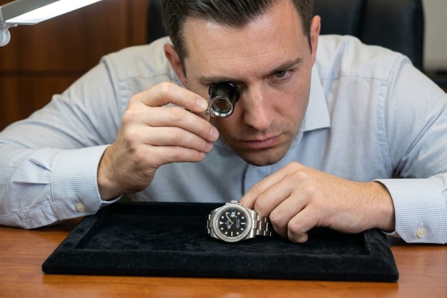 watch dealer evaluating aftermarket diamond customization